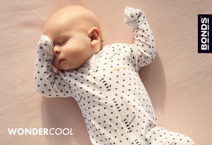 Baby wearing Bonds Wondercool.