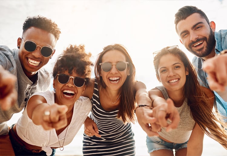 Happy people pointing.